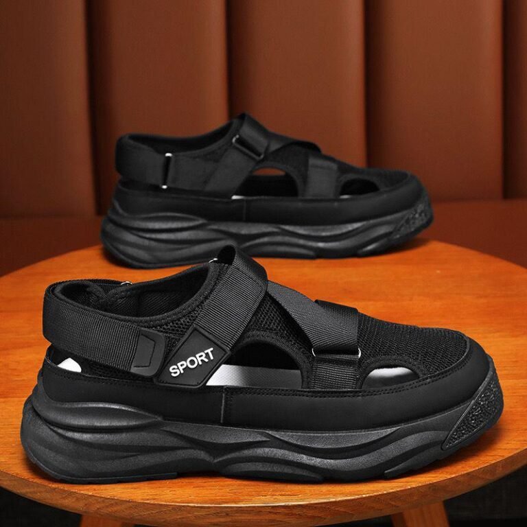 Sneakers and loafers in black, featuring a mix of mesh and leather, with the brand name 'SPORT' prominently displayed. Designed for comfort and style, these are the best choice for your style.