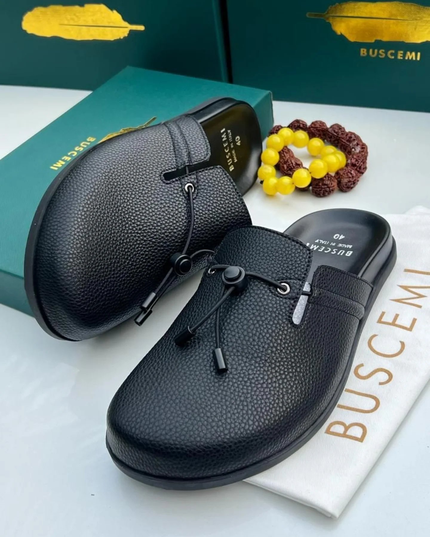 Sneakers and loafers in various styles, showcasing the versatility of Buscemi Loafer. Browse our online store for the latest fashion and footwear options.