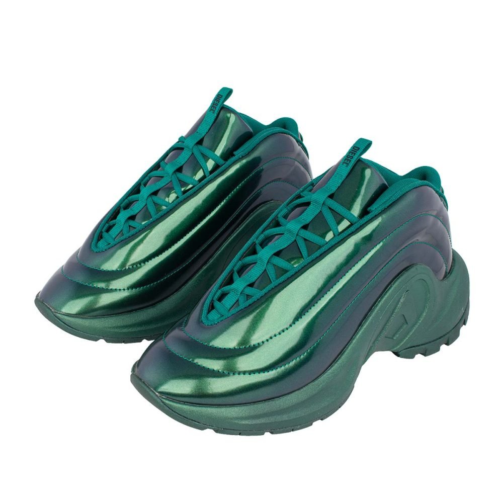Sneakers in a vibrant teal color, designed with a sleek, modern aesthetic. Featuring a unique curved design and high-quality materials.
