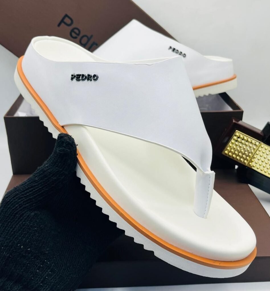 Sneakers, loafers, and sandals in white and orange, designed for everyday wear and a touch of style.