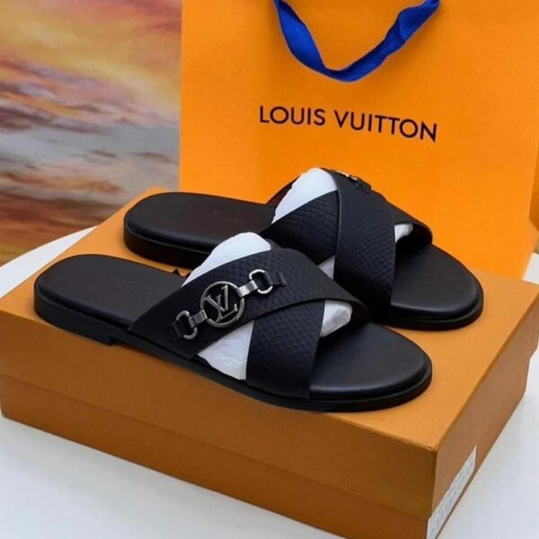 Sneakers, loafers, and slip-ons in black leather, featuring a distinctive cross-stitch pattern and a silver buckle closure. Designed for both men and women, these sandals are perfect for everyday wear or special occasions.