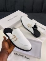 The Balenciaga Men's Mules Half-shoes combine effortless style with luxury craftsmanship. Designed for easy wear, these slip-ons feature a modern, minimalist silhouette in premium materials. Perfect for relaxed or polished outfits, they deliver comfort and high-end sophistication in one versatile design. A statement piece for the fashion-conscious man.